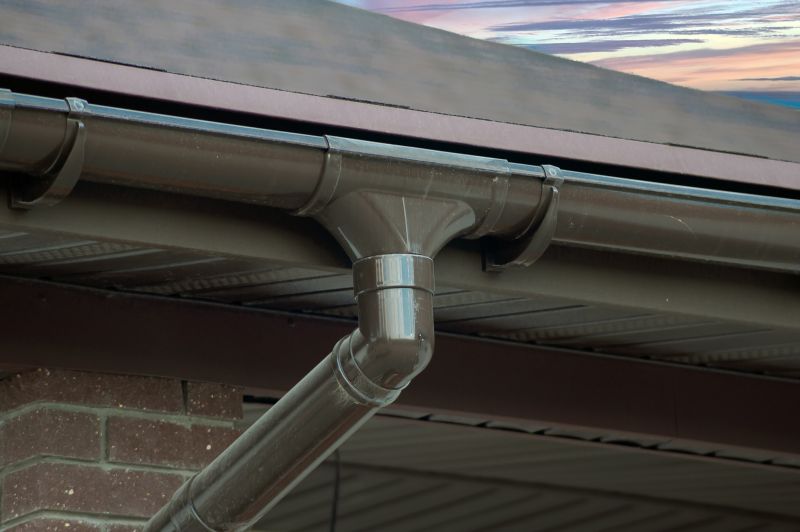 Downspout Reattachment in Boulder, CO